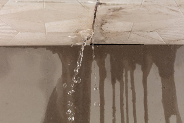 Professional Sewage Cleanup technician working in Sand Lake, NY
